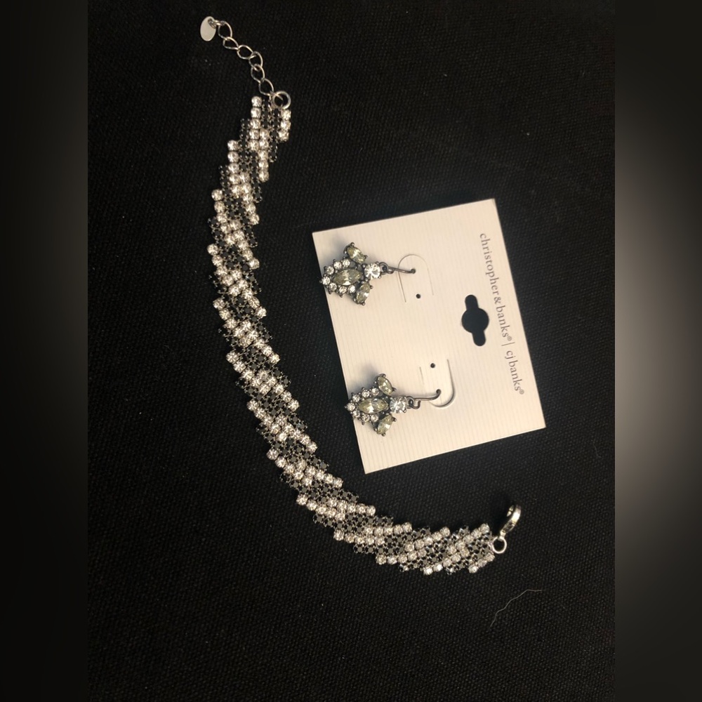 Bracelet and earrings. Black and silver rhinestones.